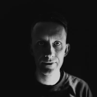 A black and white close up headshot of Marcus Lindblom