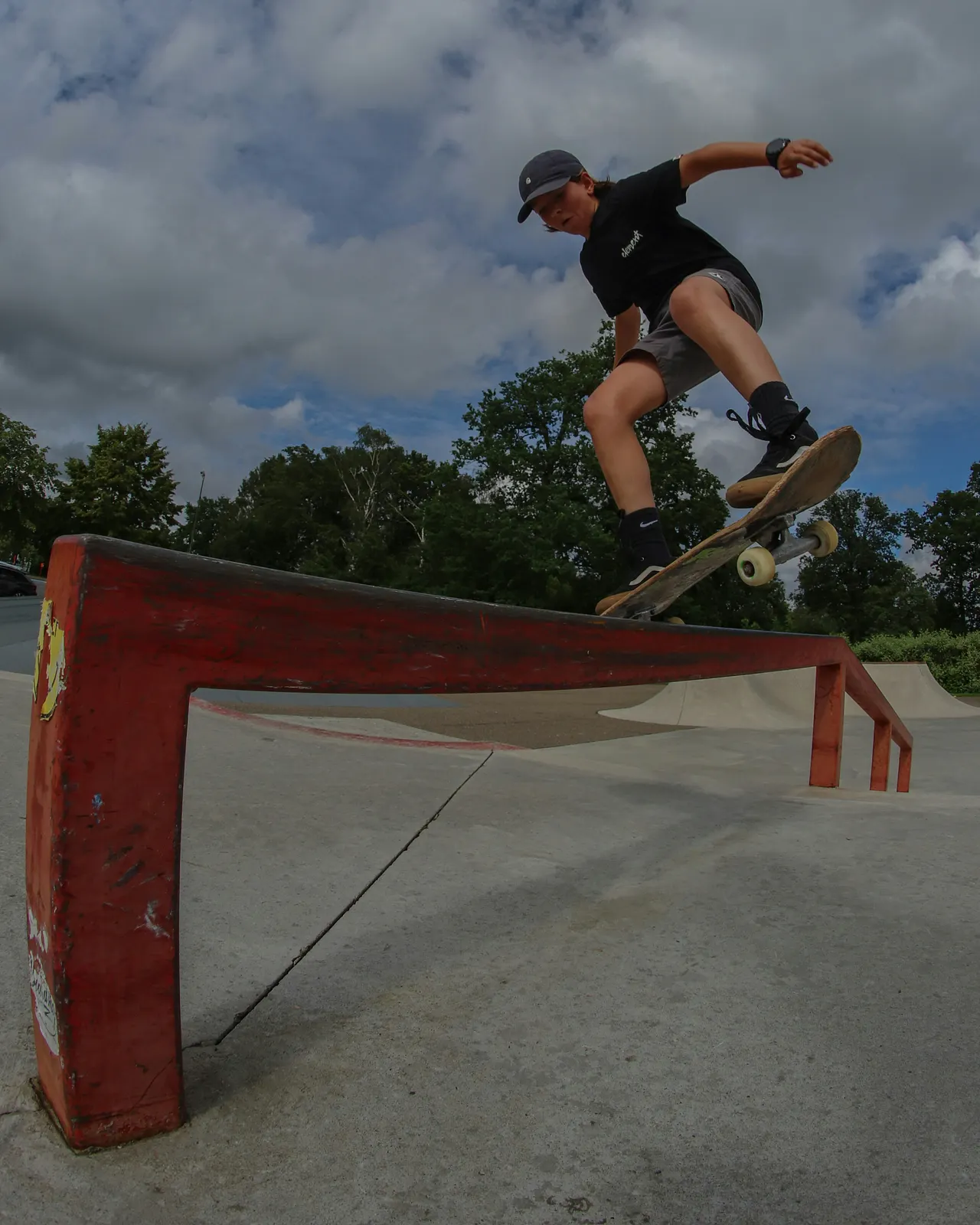 Skateboarder performing a boardslide