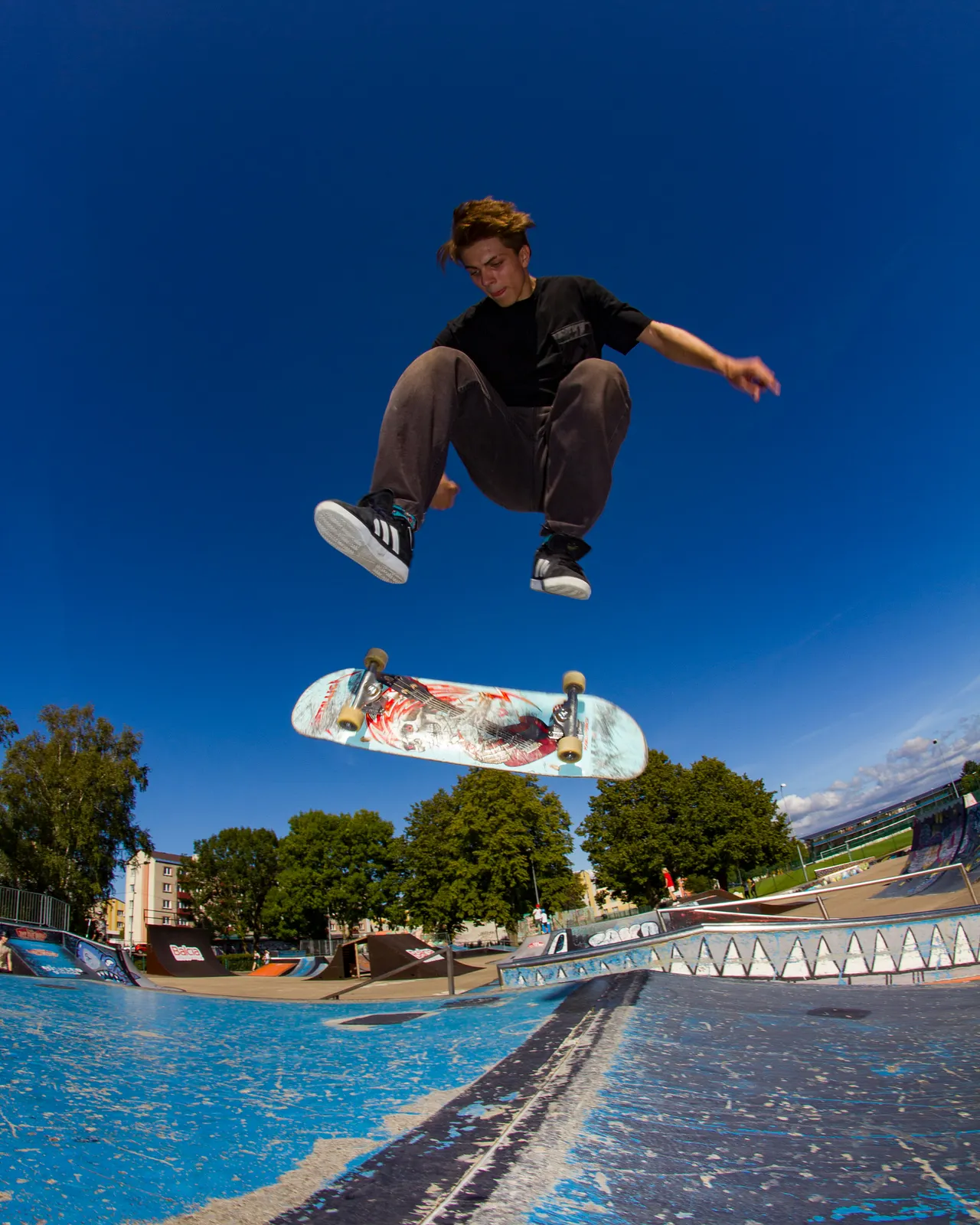 Skateboarder performing a heelflip