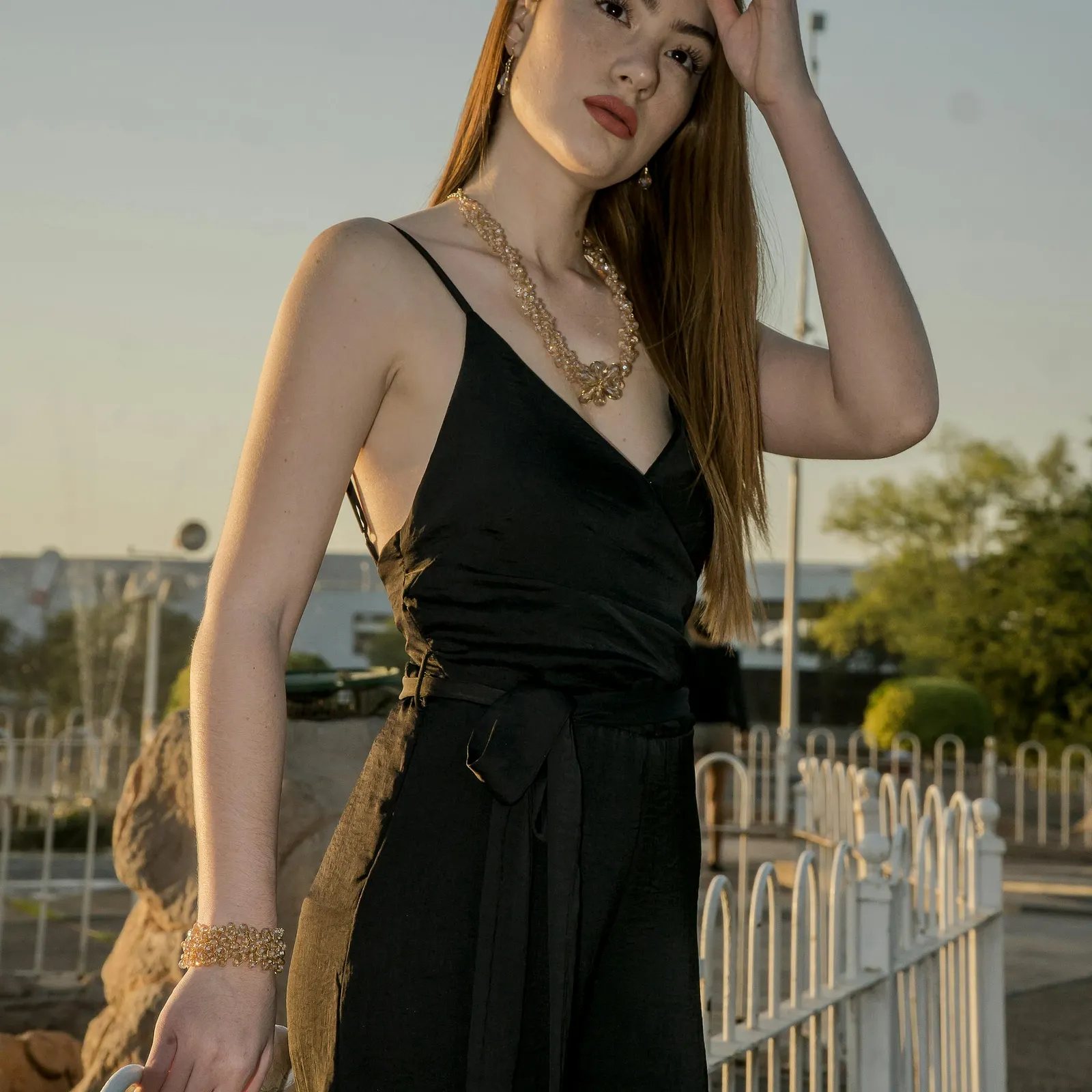 Layered 18k gold strand necklace with multiple delicate chains