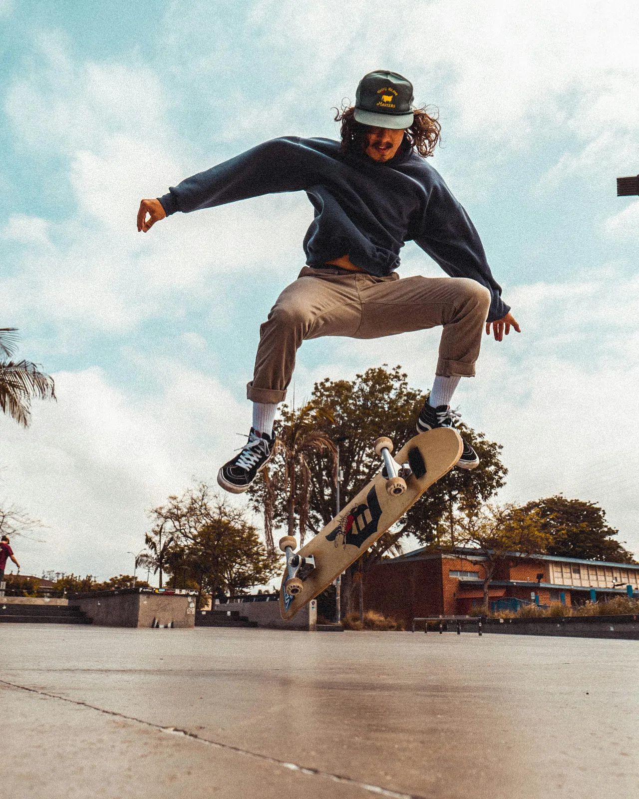 Skateboarder performing a kickflip